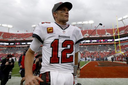 Tom Brady celebrates after defeating the Philadelphia Eagles in the NFC Wild Card Playoff game. Brady may be enticed to join a broadcasting team in 2022.