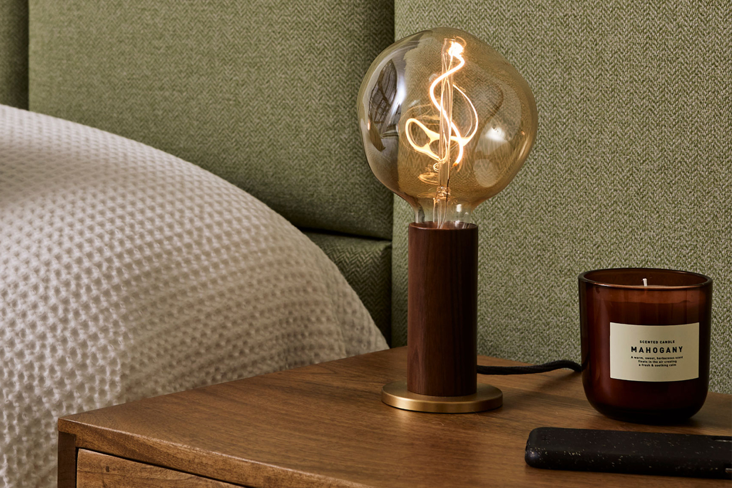 The Knuckle Table Lamp from Tala, a London-based lighting design company, that's being sold as part of DTC furniture company Burrow's new Bedroom collection, which launched in February 2022