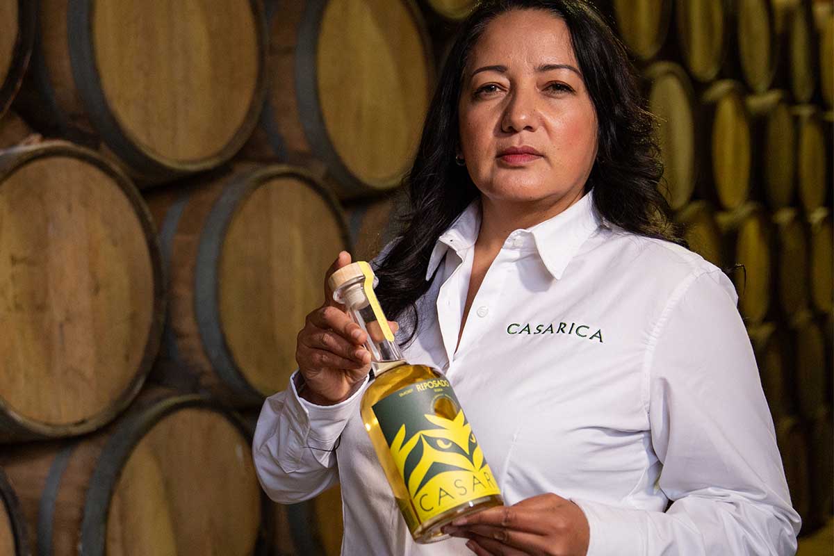 Casa Rica’s distiller is Zandra Gomez Santiago with a bottle of Casa Rica Reposado