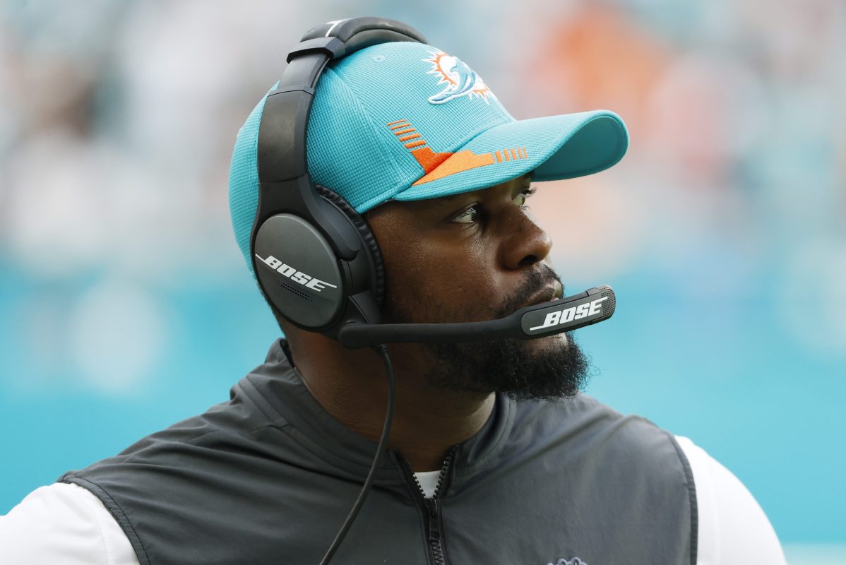 Brian Flores looks on from the sideline while coaching the Miami Dolphins