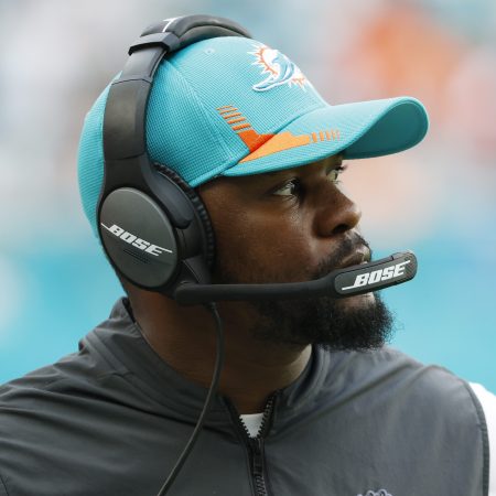 Brian Flores looks on from the sideline while coaching the Miami Dolphins
