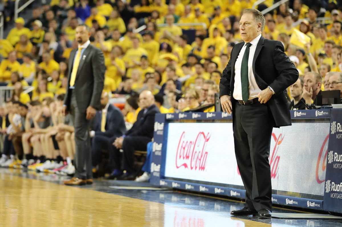 Head coach Tom Izzo of the Michigan State Spartans and head coach Juwan Howard of the Michigan Wolverines. Despite a violent incident involving Howard, Izzo is in favor of the handshake line.
