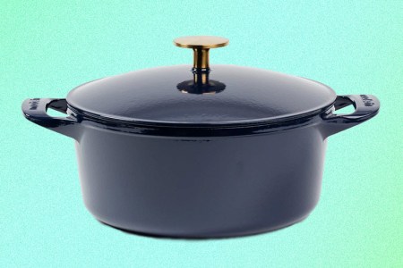 The new Enameled Cast Iron Dutch Oven from Made In, the cookware company based in Austin, Texas. This French-made pot comes in navy blue with a brass-colored knob on the lid.