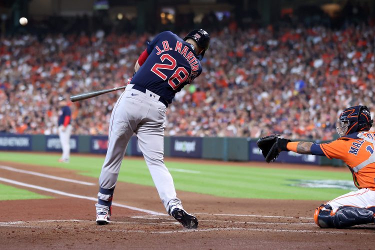 Boston DH J.D. Martinez hits a grand slam home run