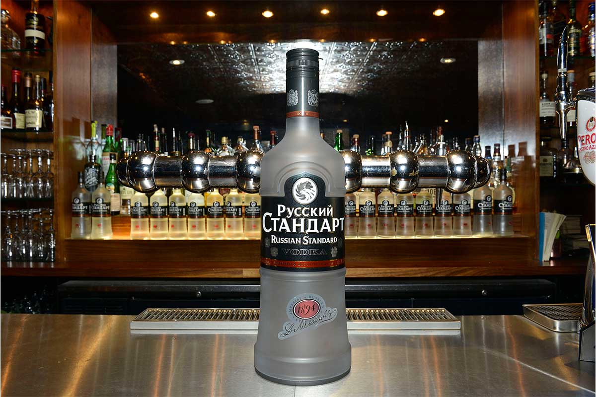 A bottle of Russian Standard vodka sitting on a bar. It's the rare bottle of vodka in the U.S. that's actually made in Russia.