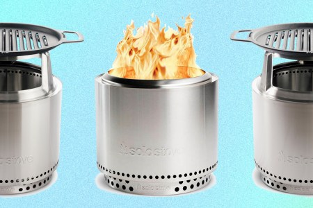 Three stainless steel Bonfire firepits from Solo Stove, one with a roaring fire and two with cast iron grills on top