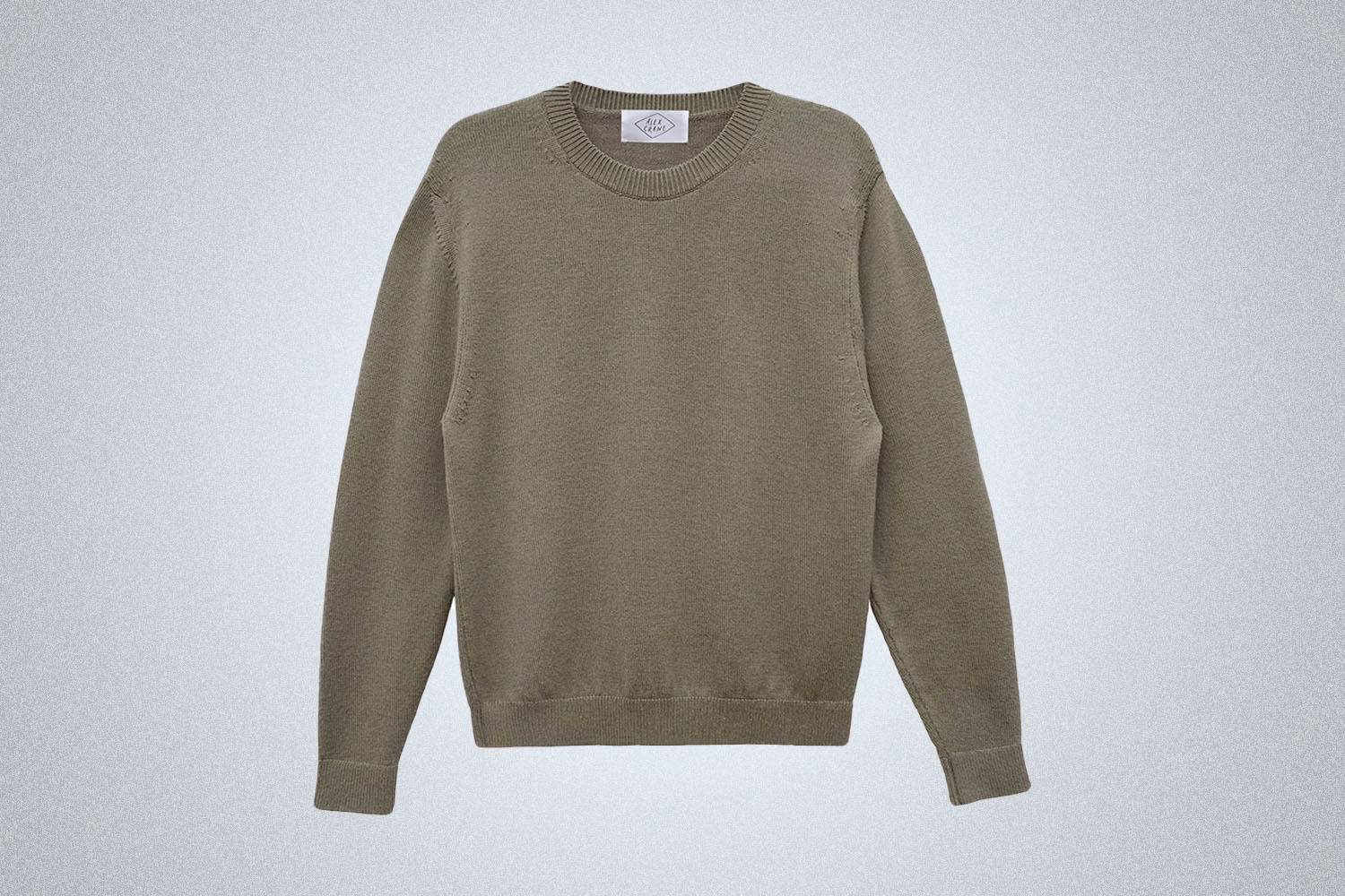 a green sweater on a gray background