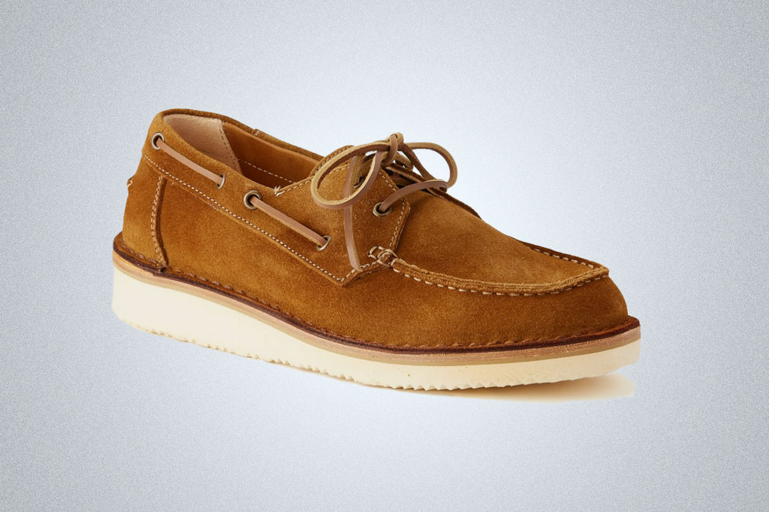 a boat shoe on a grey background