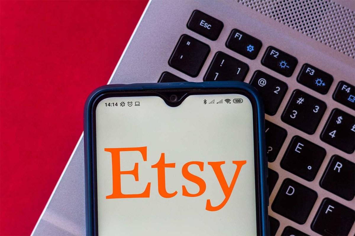 In this photo illustration the Etsy logo seen displayed on a smartphone. Here's why Etsy sellers are going on strike in April 2022.