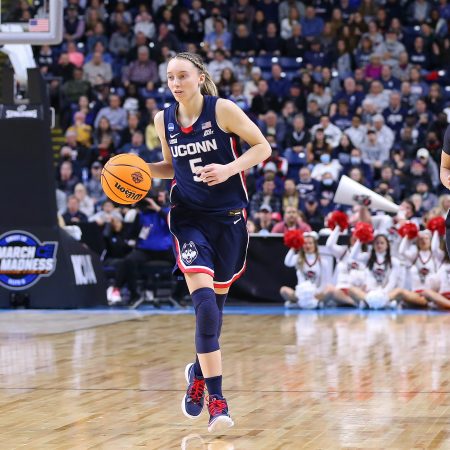UConn Huskies guard Paige Bueckers with the ball during the Elite Eight of the Women's Div I NCAA Basketball Championship.