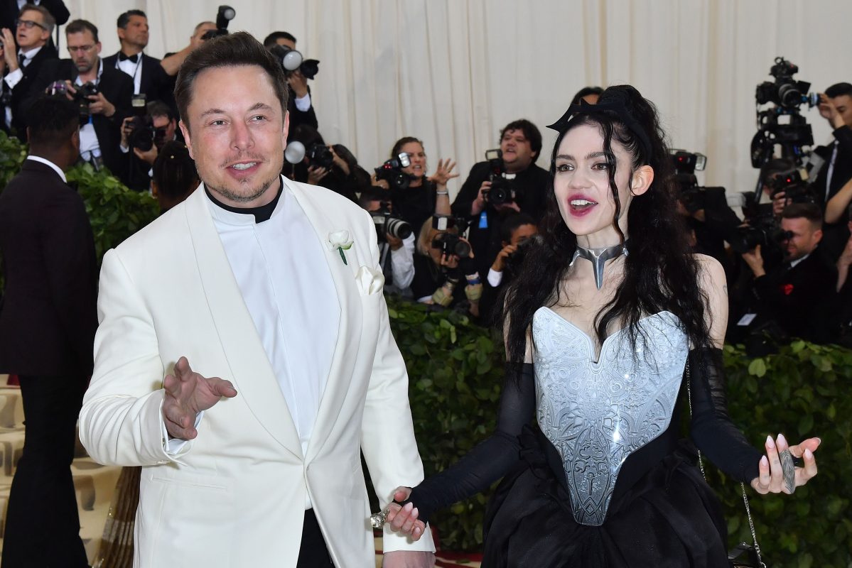 Elon Musk and Grimes arrive for the 2018 Met Gala on May 7, 2018, at the Metropolitan Museum of Art in New York. The singer claims Musk "lives below the poverty line"