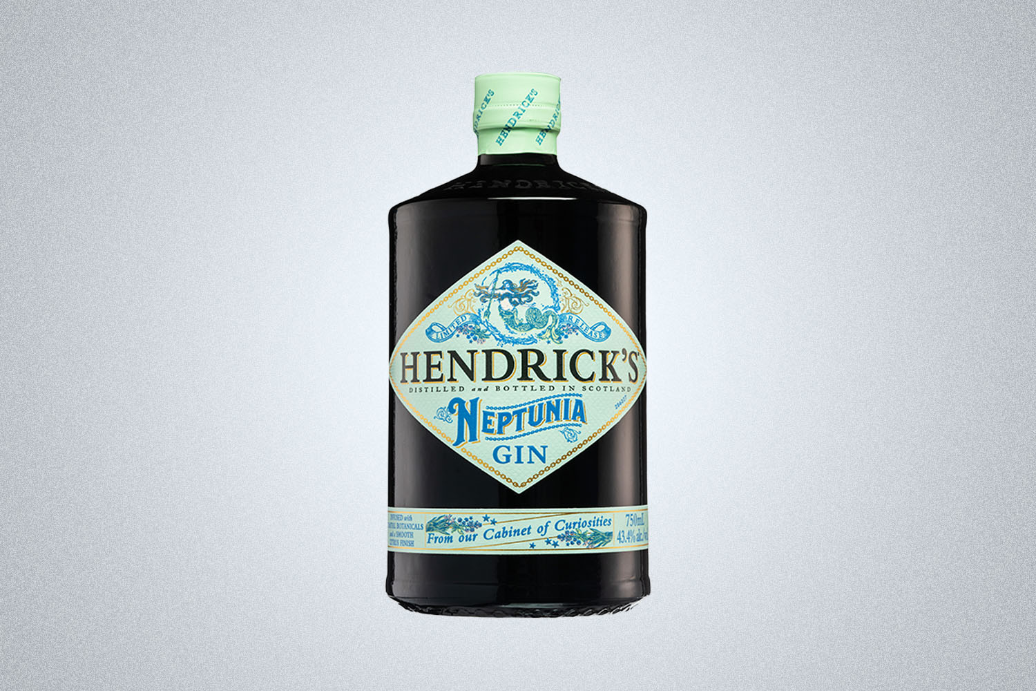 a bottle of gin on a grey background