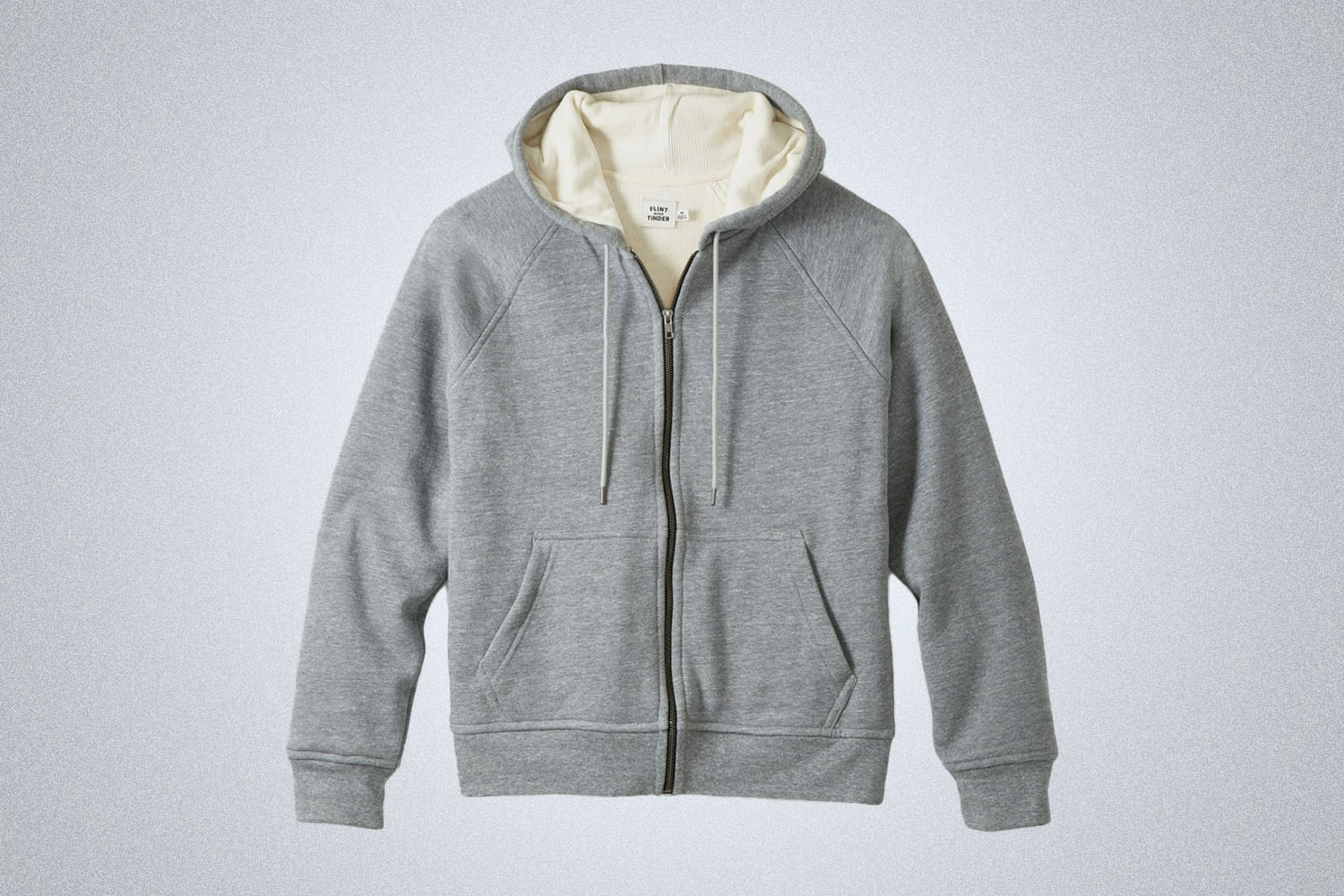 a hoodie on. grey background 