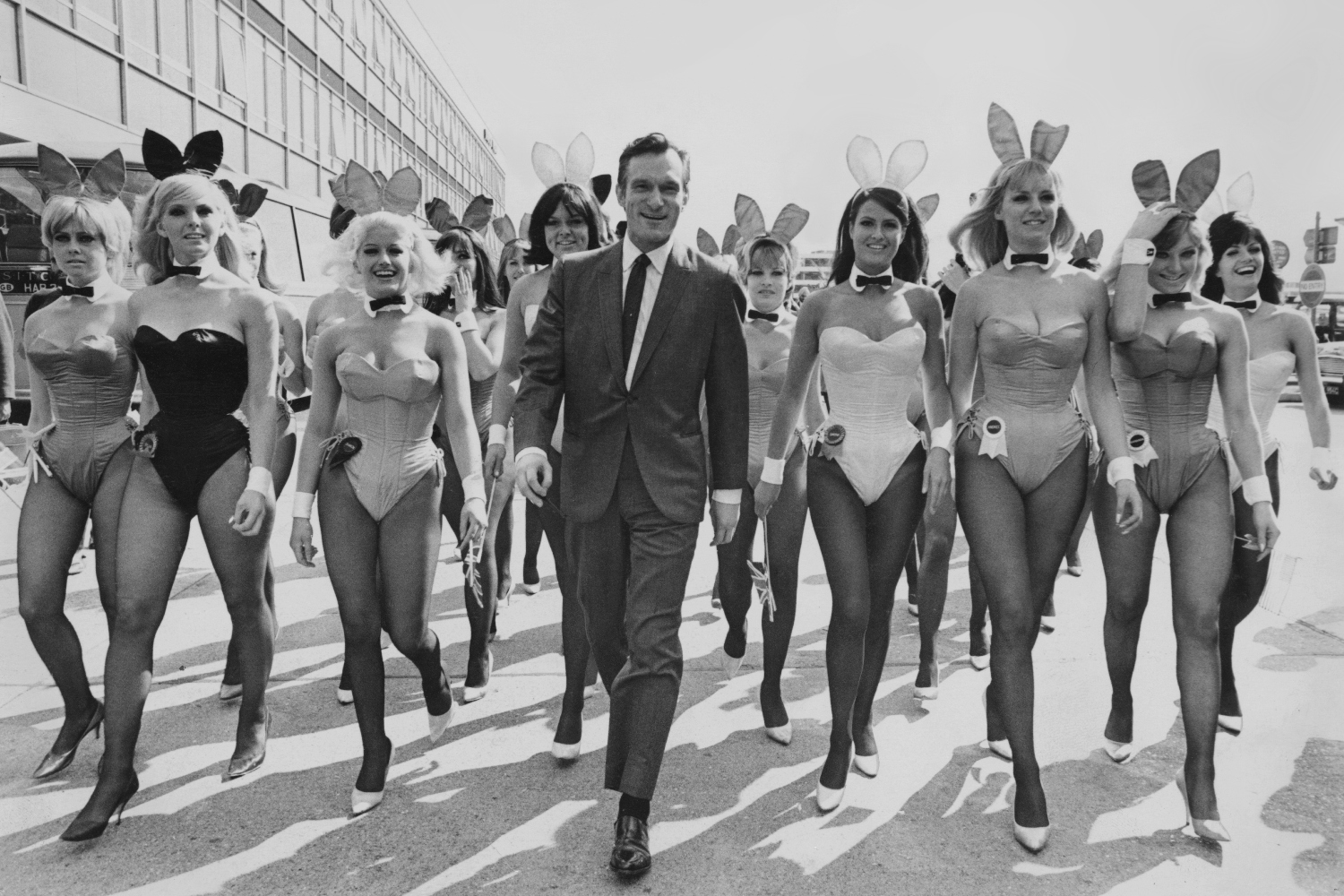 American publisher Hugh Hefner arrives at London Airport from Chicago with an entourage of Playboy Bunnies, 26th June 1966. He is in the capital for the opening of the London Playboy Club on Park Lane.