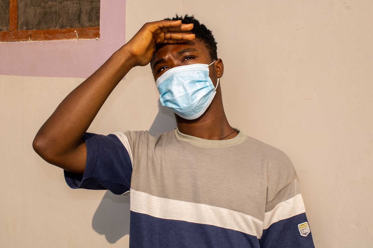 A man wearing a blue medical mask. A recent study found that people find those wearing medical face masks sexier than those without.