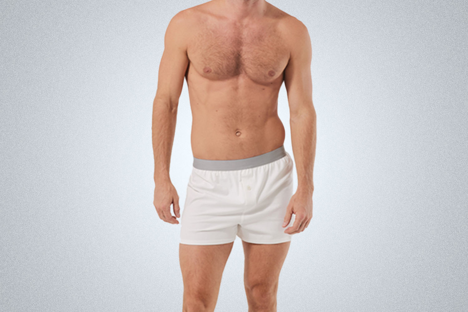 a pair of white underwear on model on a grey background