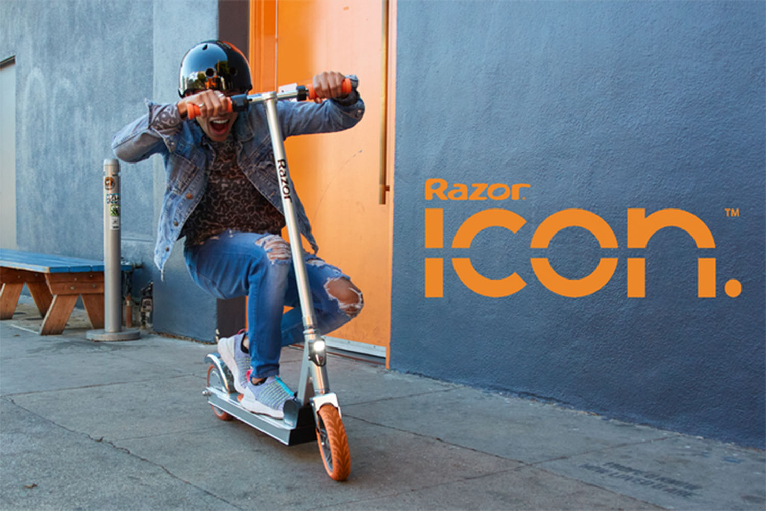 a model on a razor scooter