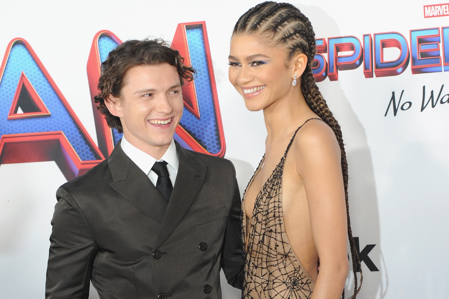 Tom Holland and Zendaya attend Sony Pictures' "Spider-Man: No Way Home" Los Angeles Premiere held at The Regency Village Theatre on December 13, 2021 in Los Angeles, California.