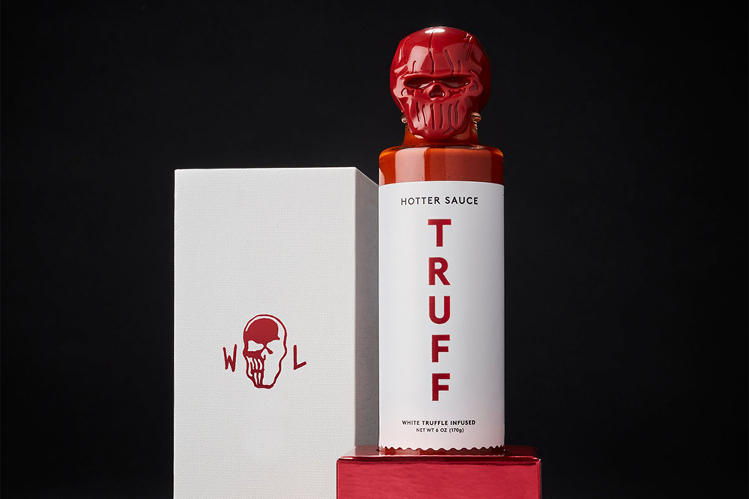 A bottle of Truff with a skull head