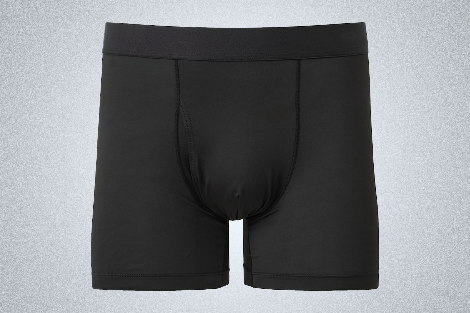 a black pair of underwear on a grey background