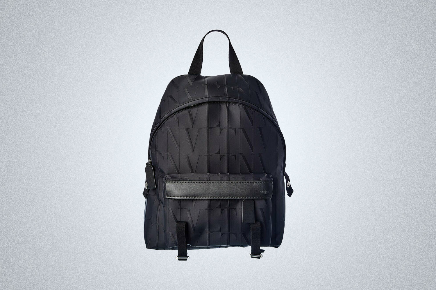 a Valetnino backpack on a grey background