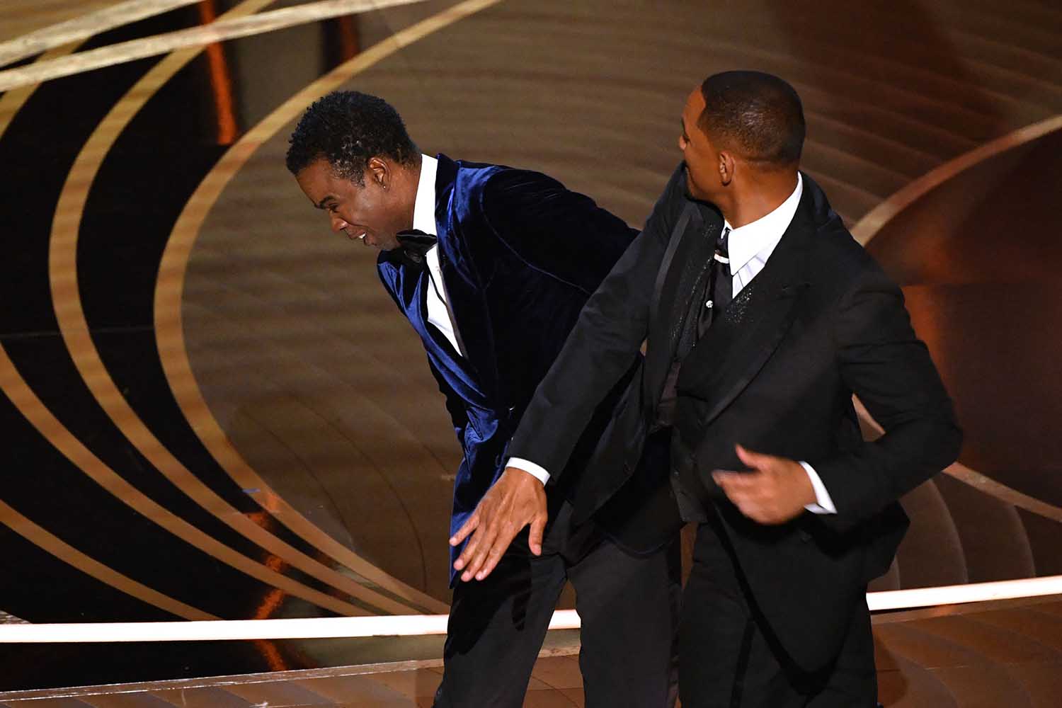 Will Smith Slapping Chris Rock at the Oscars with Celebrity Memoir Bookclub logo on the left corner