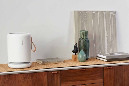 The Molekule Air Mini+ on a hallway table. The air purifier was built for small spaces.