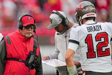Tom Brady discusses a play with ex-Tampa Bay Buccaneers head coach Bruce Arians. As Arians steps down as Tampa Bay head coach in March 2022, it appears Brady is calling the shots.