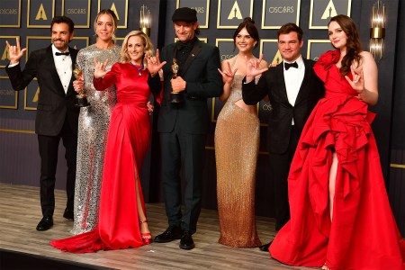 The cast of CODA hold their award for Best Picture in the press room during the 94th Oscars at the Dolby Theatre in Hollywood, California on March 27, 2022.