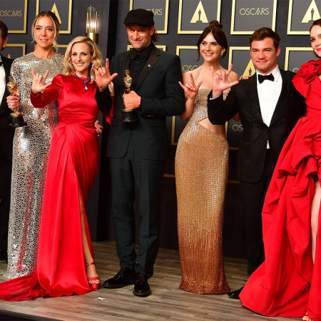 The cast of CODA hold their award for Best Picture in the press room during the 94th Oscars at the Dolby Theatre in Hollywood, California on March 27, 2022.