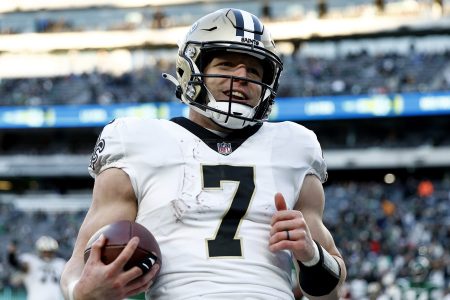 Taysom Hill of the New Orleans Saints runs for a touchdown against the Jets at MetLife Stadium