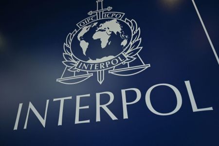 The Interpol logo. The organization recently detailed the results of Operation Pandora IV, which recovered thousands of cultural artifacts after a trafficking bust.