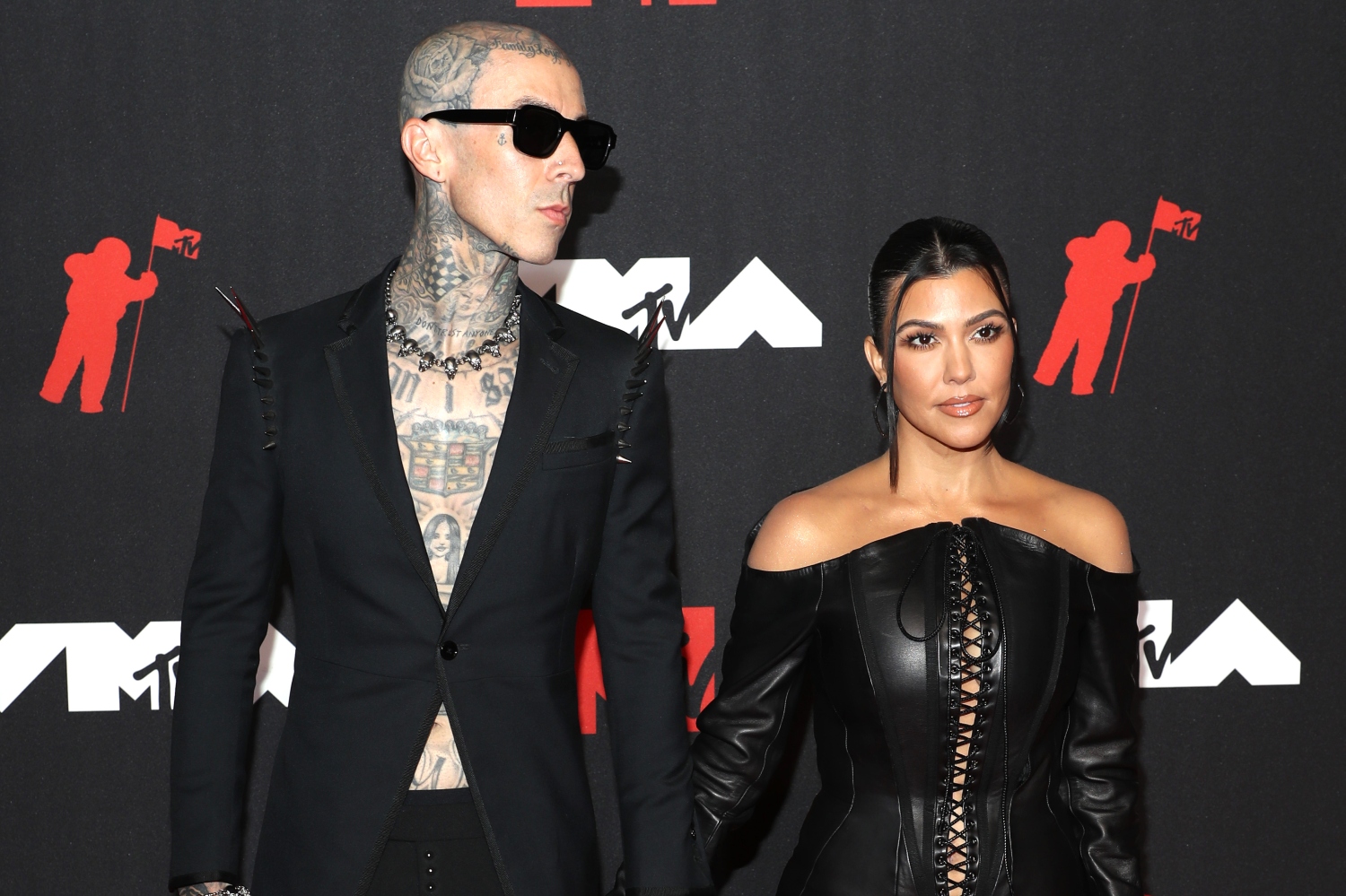 Travis Barker and Kourtney Kardashian attend the 2021 MTV Video Music Awards at Barclays Center on September 12, 2021. They recently announced that they had done a sex fast as part of a cleanse — but you don't need to copy them.
