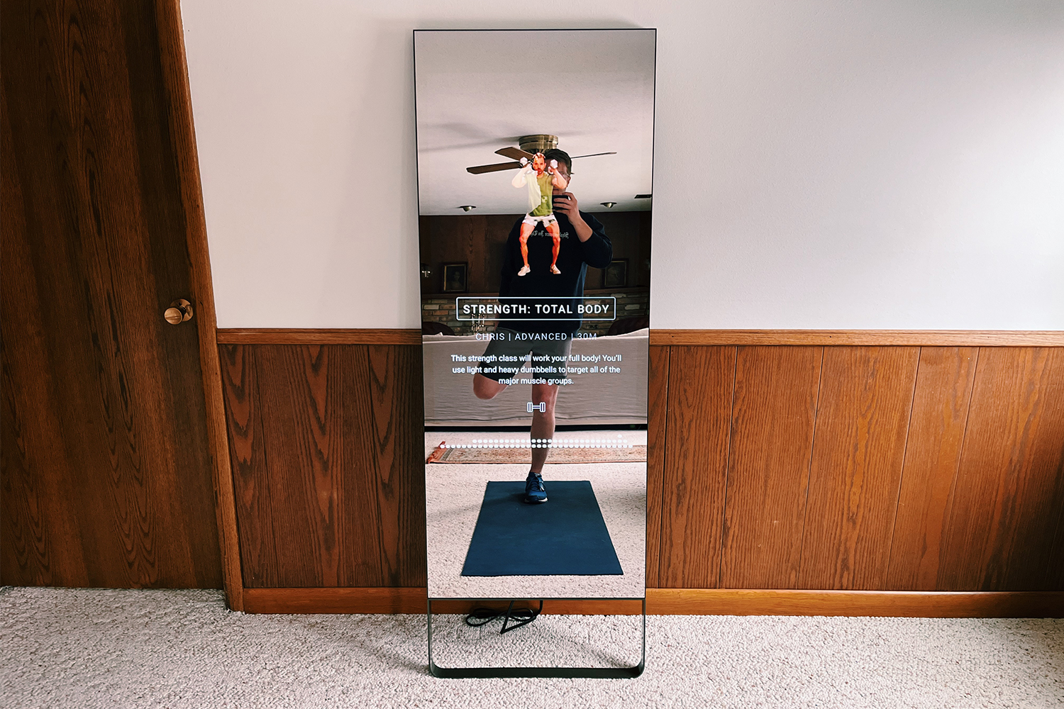 A Total  Body Mirror workout class from Chris pulled up on the exercise mirror. We reviewed the machine to see if it's a good option for working out at home.