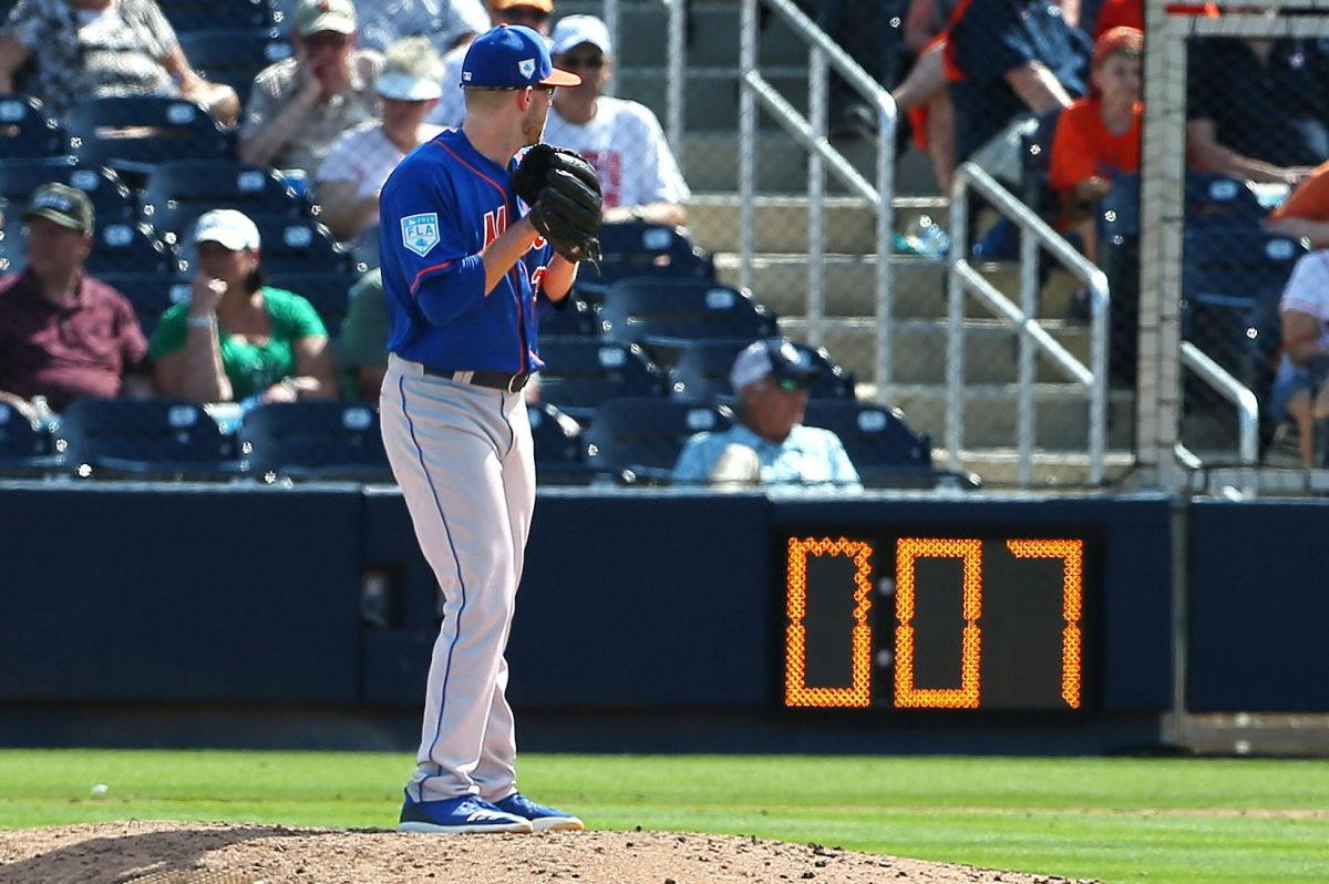 Eric Hanhold gets set as the pitch clock counts down during a spring training game in 2019