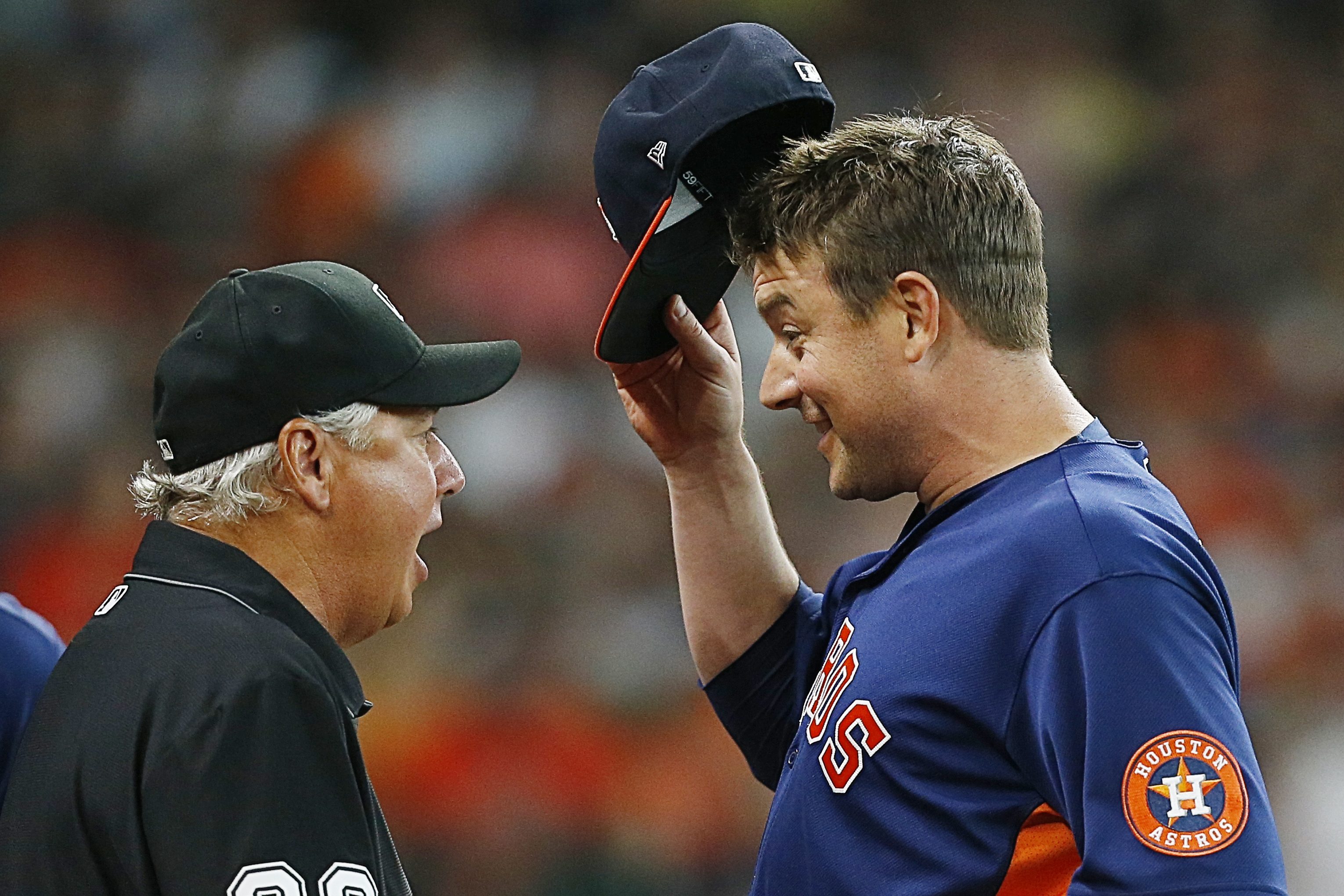 Umpire Tom Hallion checks Joe Smith of the Houston Astros for foreign substances