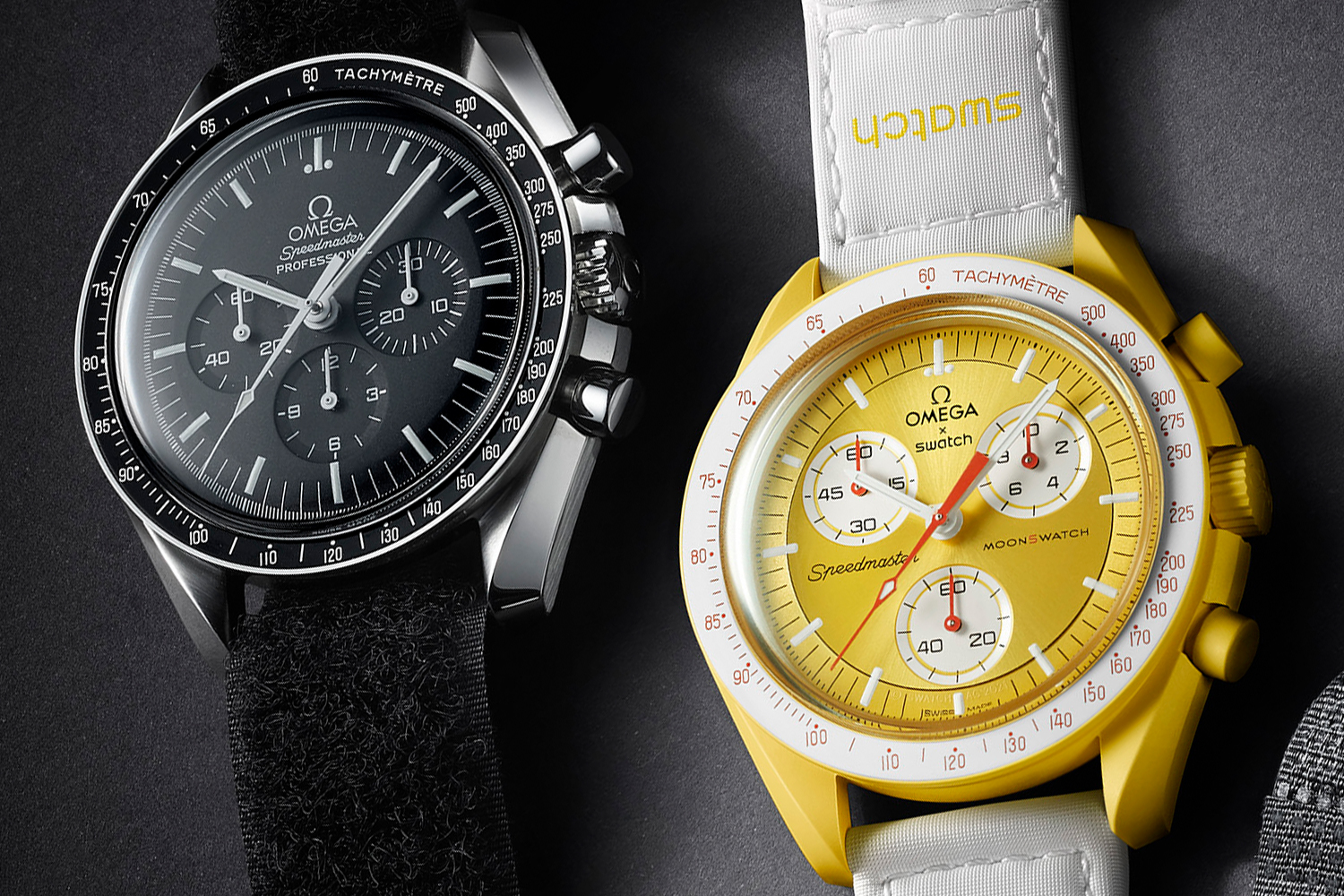 The original Omega Moonwatch next to the new Omega x Swatch MoonSwatch, specifically the golden Mission to the Sun model