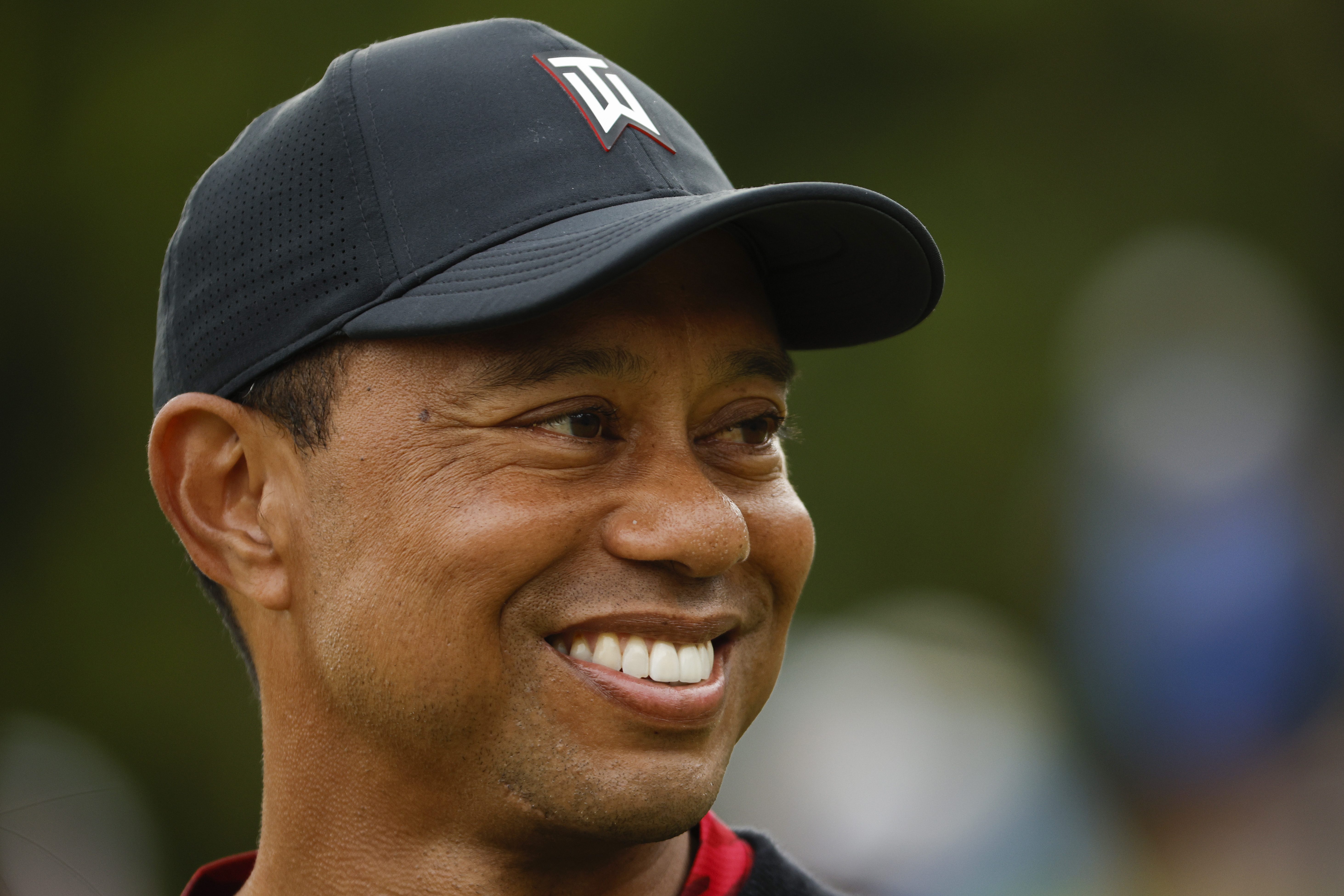 Tiger Woods smiles after the final round of The Genesis Invitational at Riviera Country Club