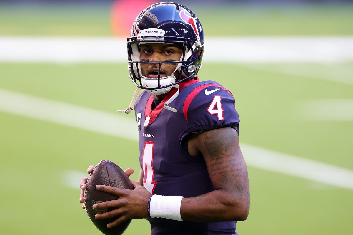 Deshaun Watson of the Texans participates in warmups prior to a game against the Titans in 2021
