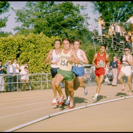 Steve Prefontaine leads the pack at a collegiate track meet.