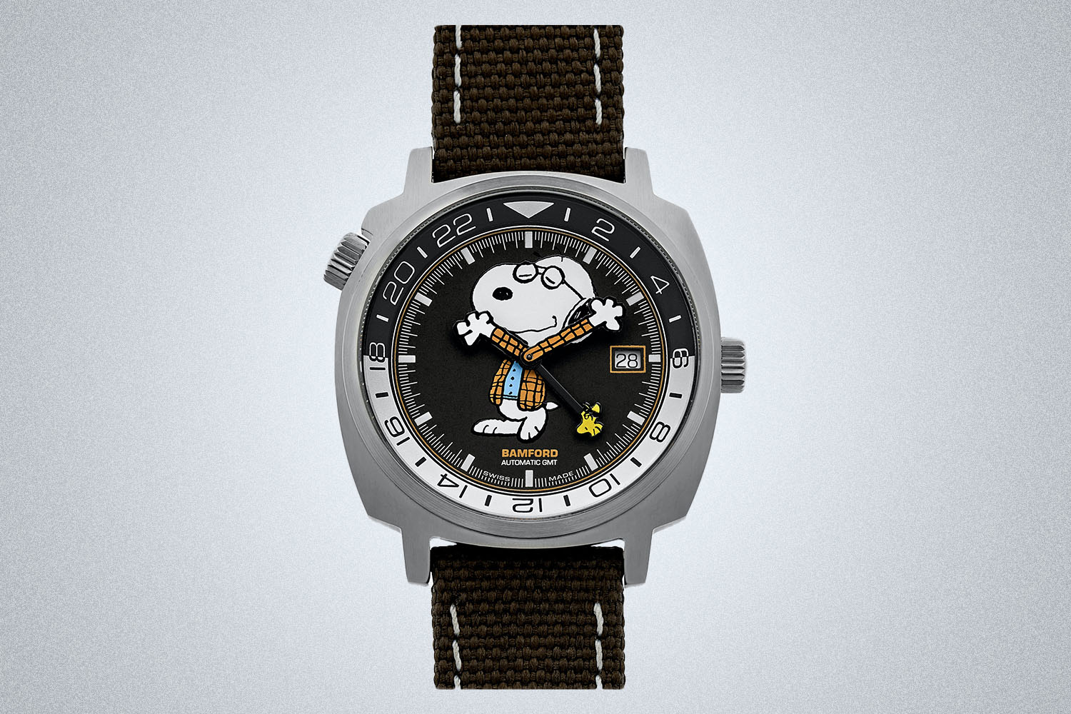 a watch with snoopy on the dial