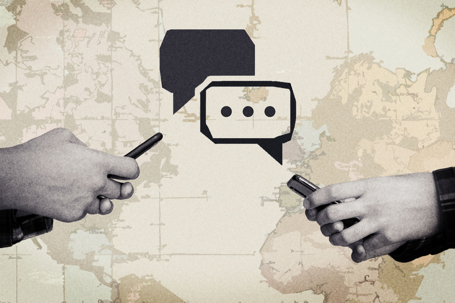 Two sets of hands texting in front of a map.