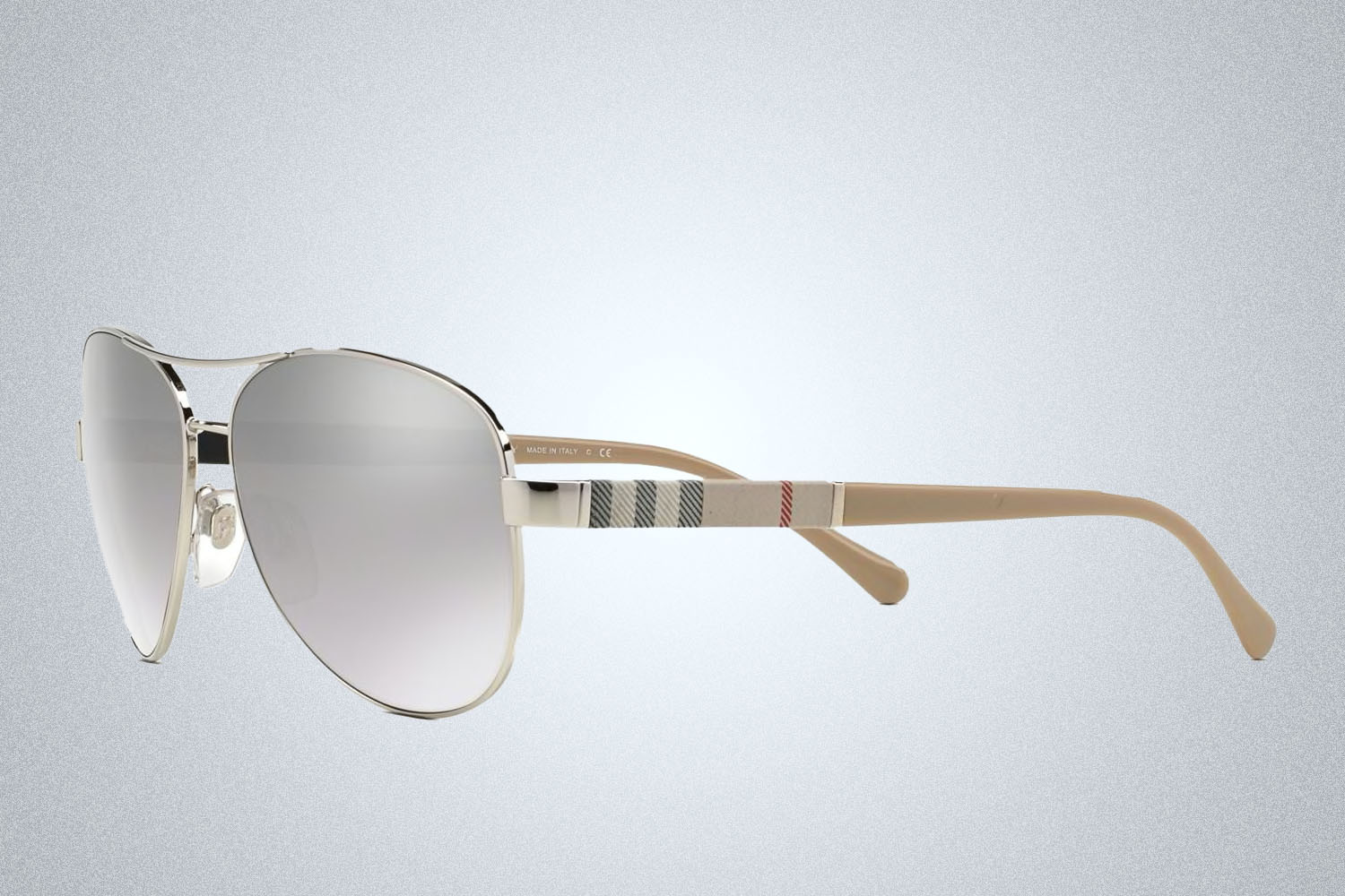 a pair of sunglasses on a grey background
