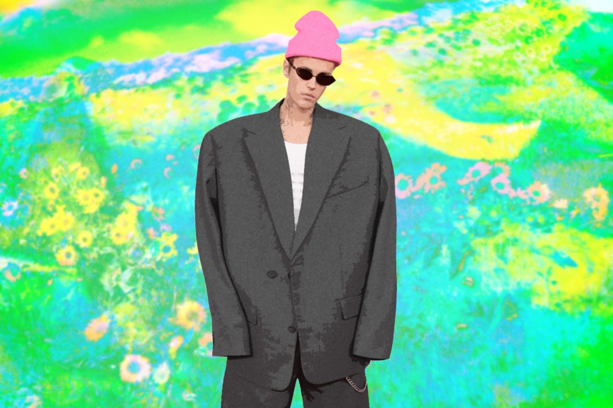 Justin Bieber in a grey Balenciaga Suit on a pink-green-yellow collaged background