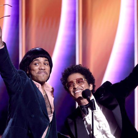 Anderson .Paak and Bruno Mars of Silk Sonic accept Record Of The Year award for "Leave The Door Open" during the 64th Annual GRAMMY Awards.