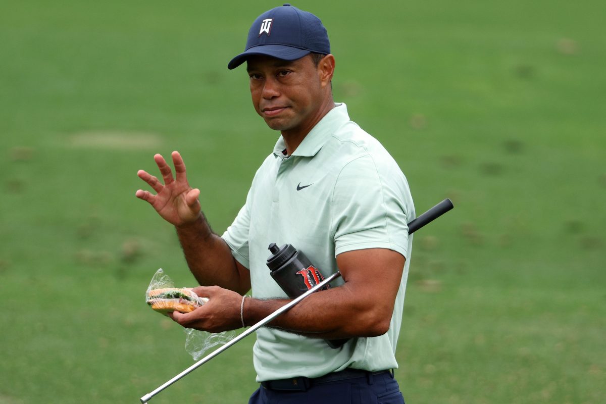 Tiger Woods warms up during a practice round prior to the Masters at Augusta National Golf Club. Is Woods a good bet to win the 86th Masters in 2022? We take a look.