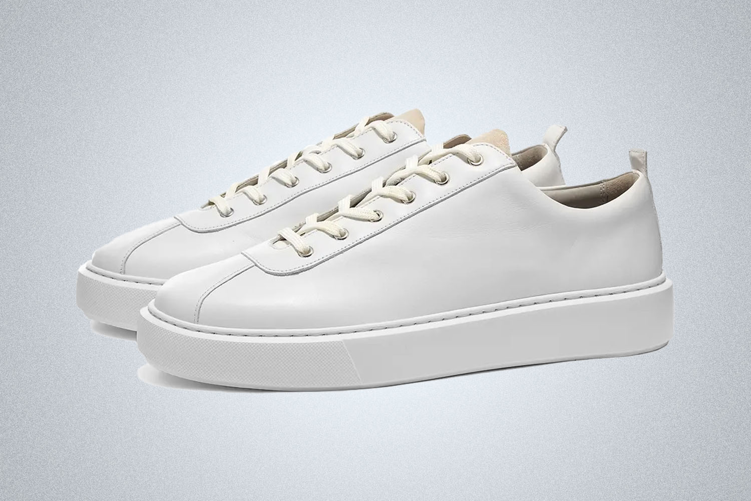 an all white Grenson 30 sneaker on a white background