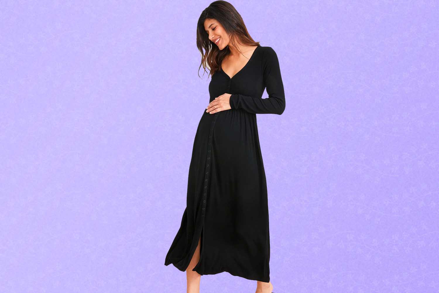 A black maternity dress, a perfect Mother's Day gift for 2022, on a purple background.
