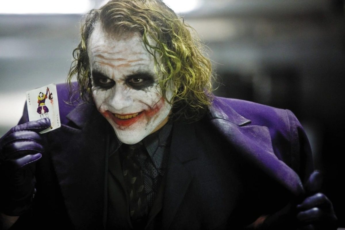 Heath Ledger as The Joker in "The Dark Knight." "Jurassic World Dominion" director Colin Trevorrow says he wants his dinosaur villain to be "like the Joker."