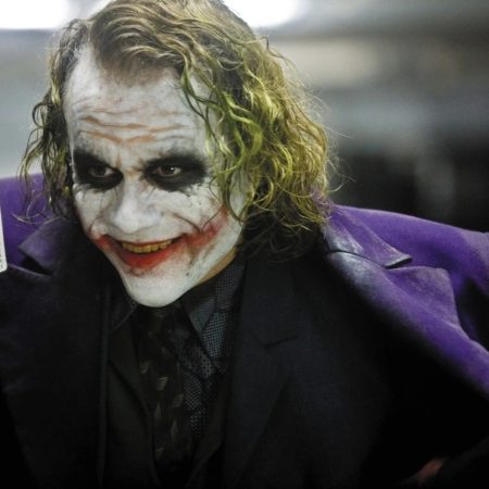 Heath Ledger as The Joker in "The Dark Knight." "Jurassic World Dominion" director Colin Trevorrow says he wants his dinosaur villain to be "like the Joker."
